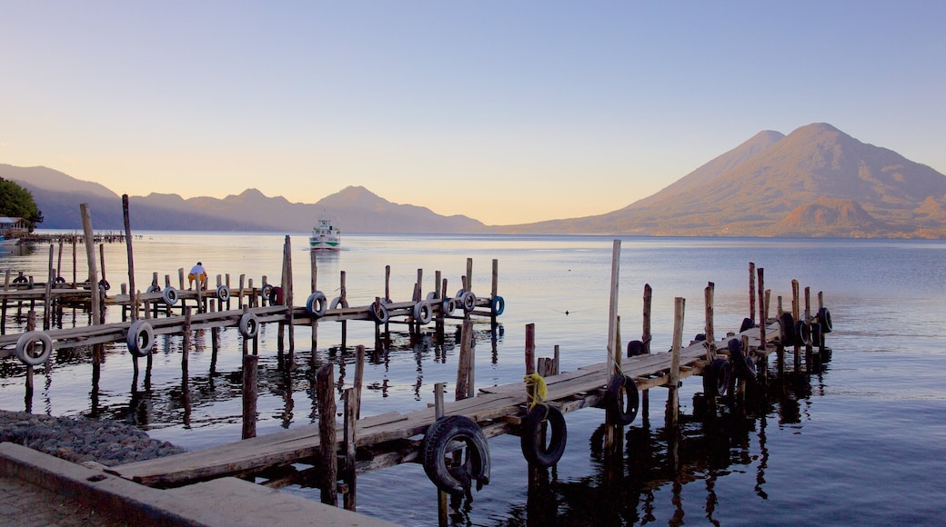 San Pedro Volcano which includes a bay or harbour, mountains and general coastal views