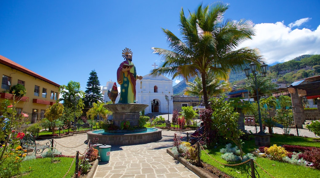 Church of Saint Peter showing a garden and a statue or sculpture