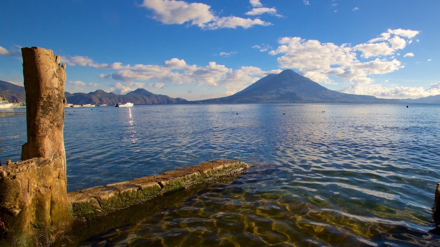 Atitlan Volcano featuring a bay or harbor, mountains and general coastal views