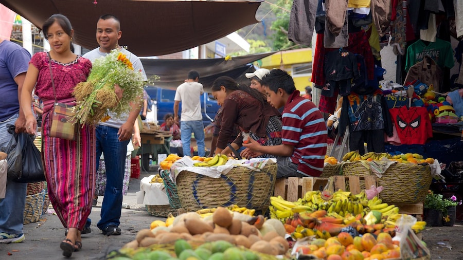 Panajachel Municipal Market featuring markets as well as a small group of people