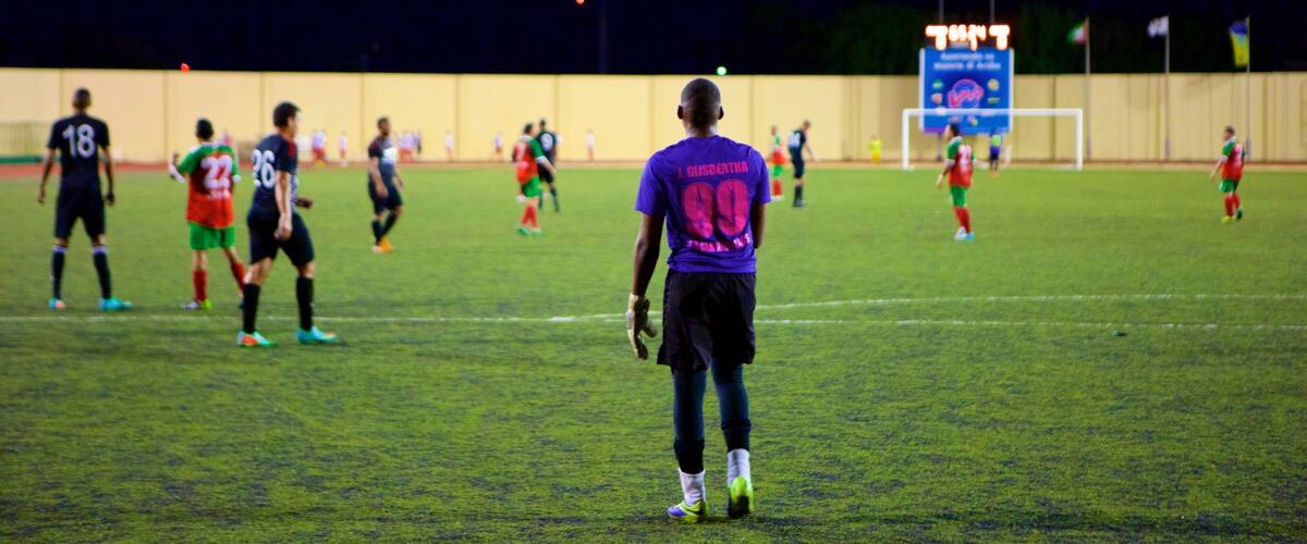 Oranjestad which includes a sporting event as well as an individual male