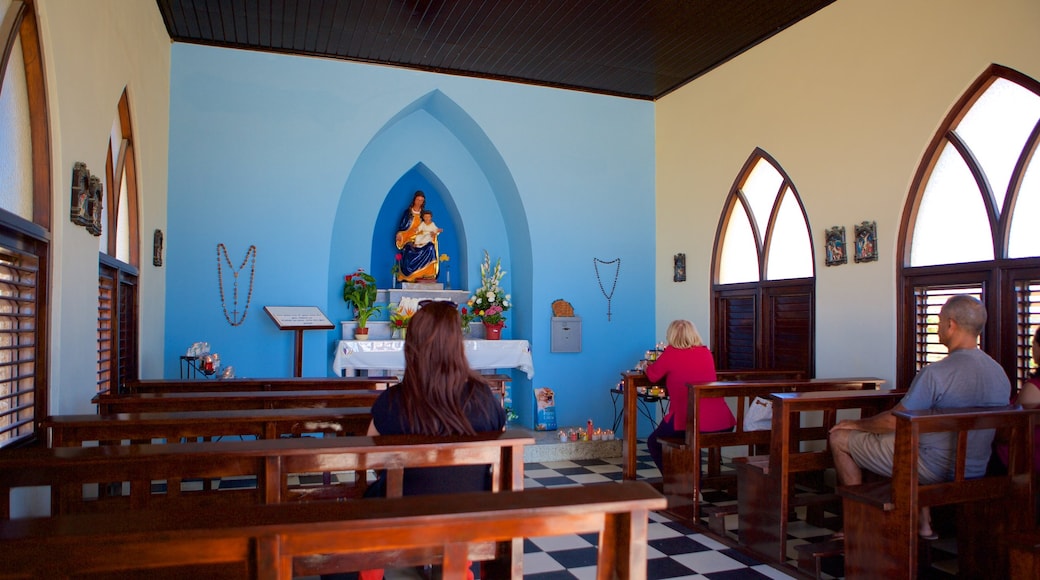 Alto Vista Chapel featuring a church or cathedral and interior views