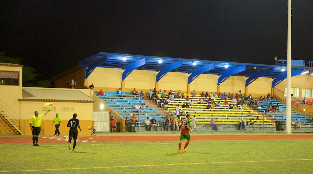 Oranjestad ofreciendo un evento deportivo y escenas nocturnas