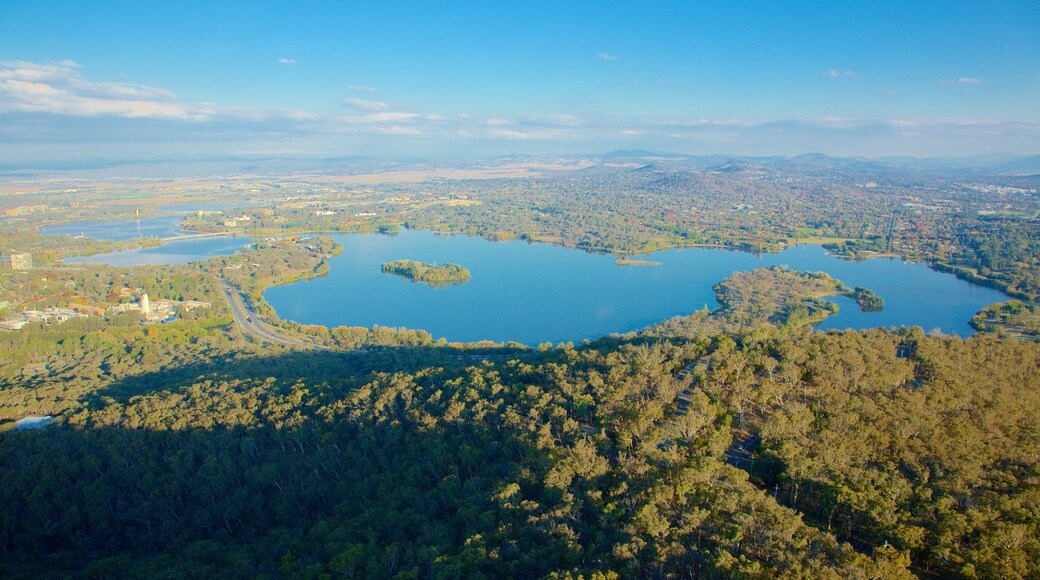 Telstra Tower featuring landscape views, forests and a lake or waterhole