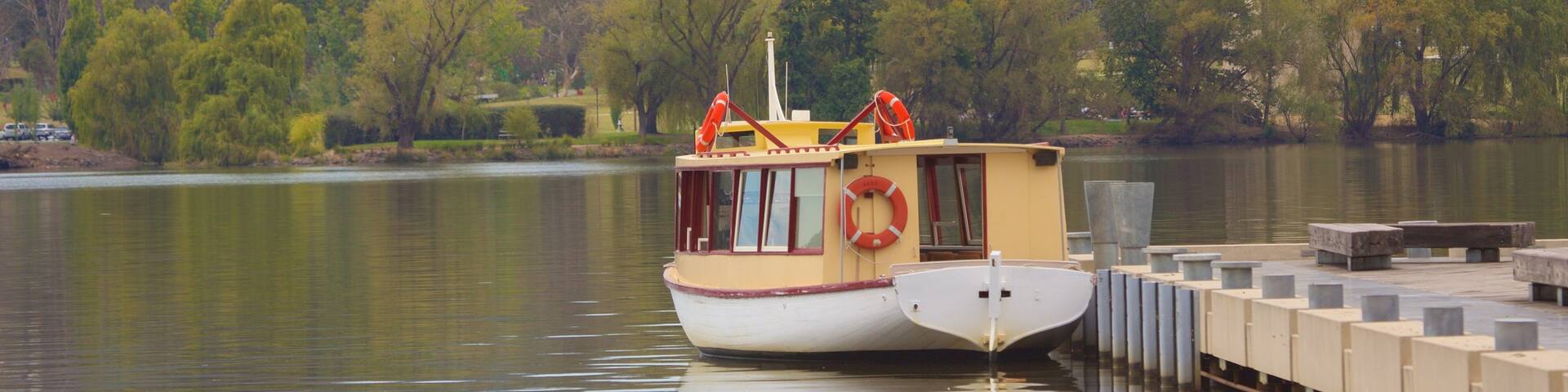 National Carillon which includes a ferry and a lake or waterhole