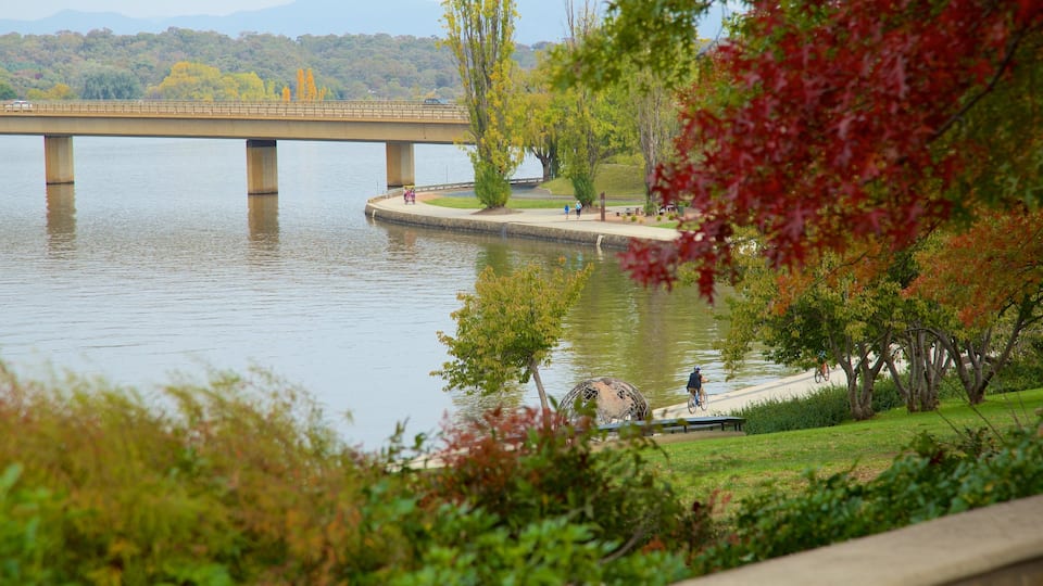 Canberra featuring fall colors, a lake or waterhole and a garden