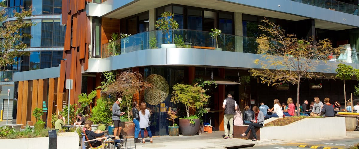 Acton which includes modern architecture and café scenes