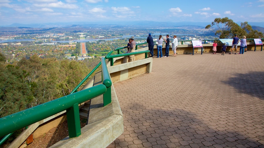 Canberra showing landscape views and views as well as a small group of people