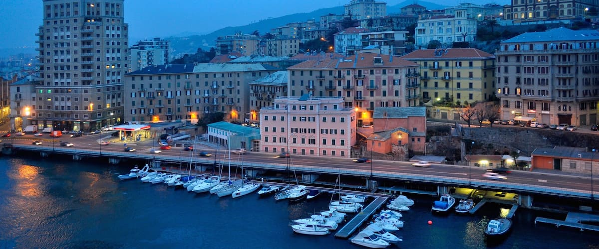 Savona featuring night scenes, a coastal town and a marina