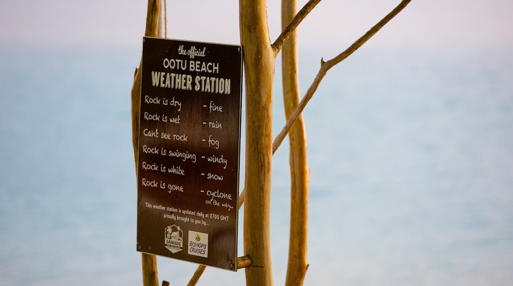 Aitutaki featuring general coastal views and signage