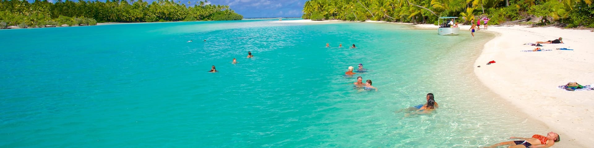 One Foot Island Beach showing a sandy beach as well as a small group of people