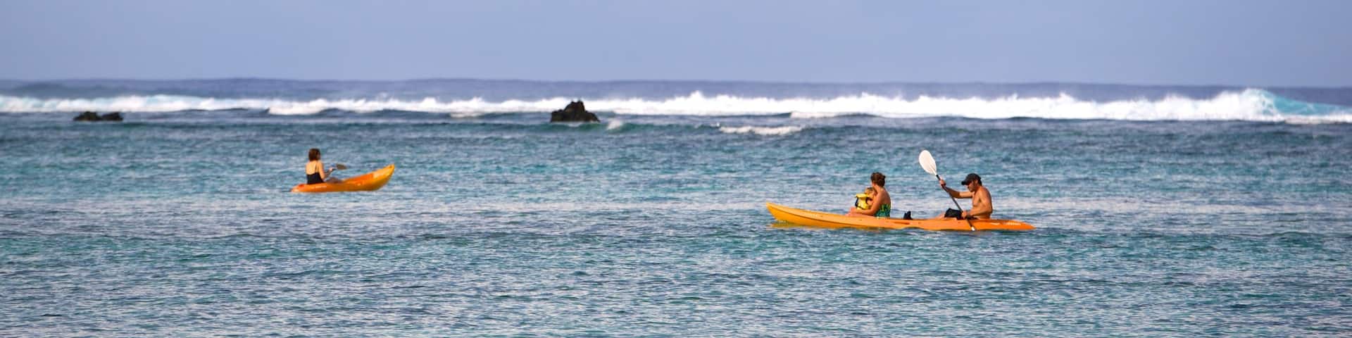 Arorangi featuring kayaking or canoeing and general coastal views