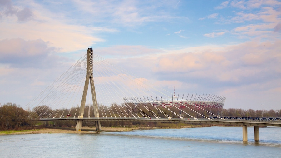 Poland which includes a river or creek and a bridge
