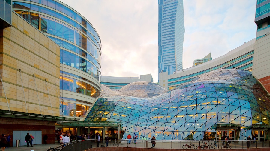 Zlote Tarasy showing a city and modern architecture