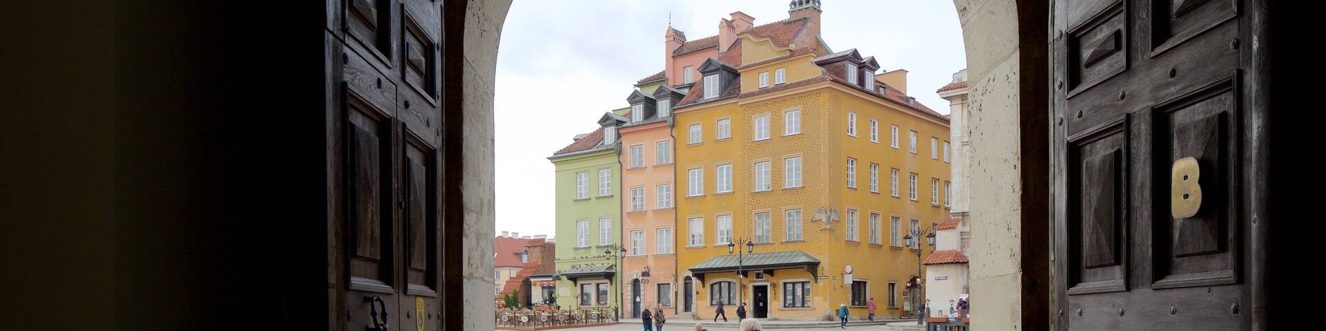Castle Square featuring heritage elements as well as a small group of people