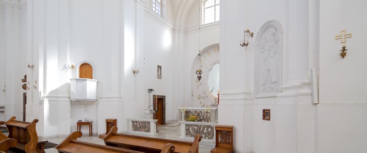St. Kazimierz Church showing a church or cathedral, heritage elements and interior views