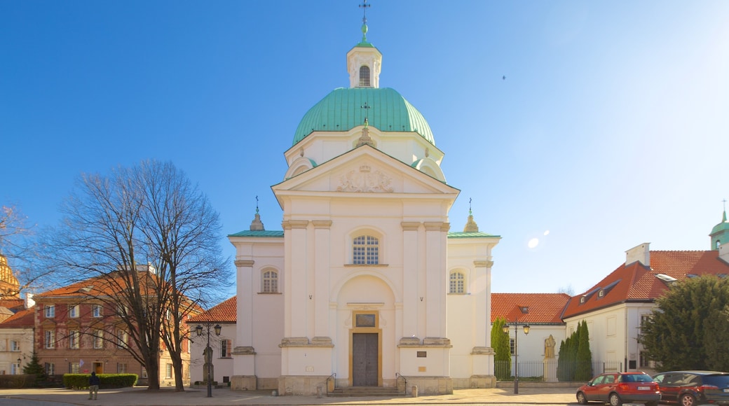 Warszawa presenterar historiska element och en kyrka eller katedral