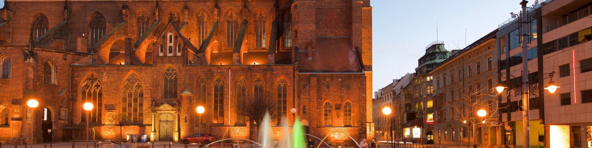 St. Mary Magdalene Church featuring night scenes and a fountain
