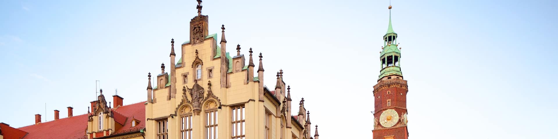Wroclaw Town Hall which includes a square or plaza and street scenes