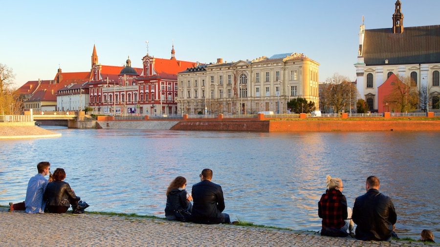 Wroclaw which includes a river or creek as well as a small group of people