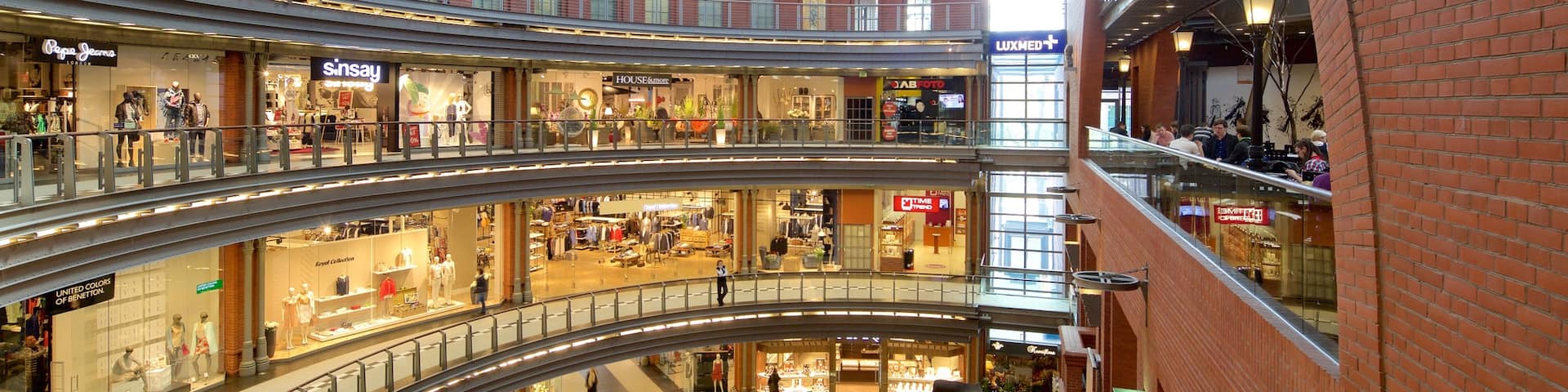 Stary Browar Shopping and Art Centre featuring shopping and interior views