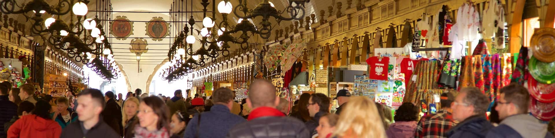 Cloth Hall featuring markets as well as a large group of people