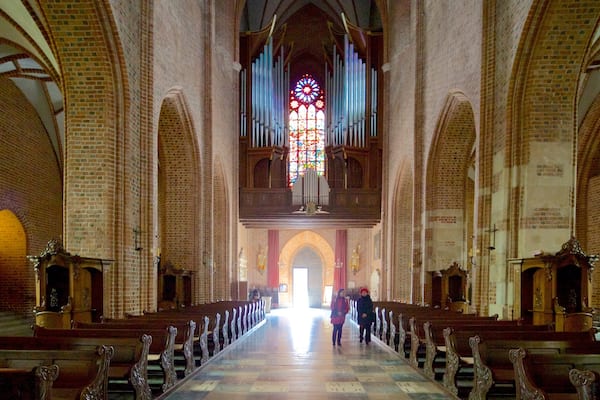 Archcathedral Basilica of St. Peter and St. Paul featuring a church or cathedral, interior views and heritage elements