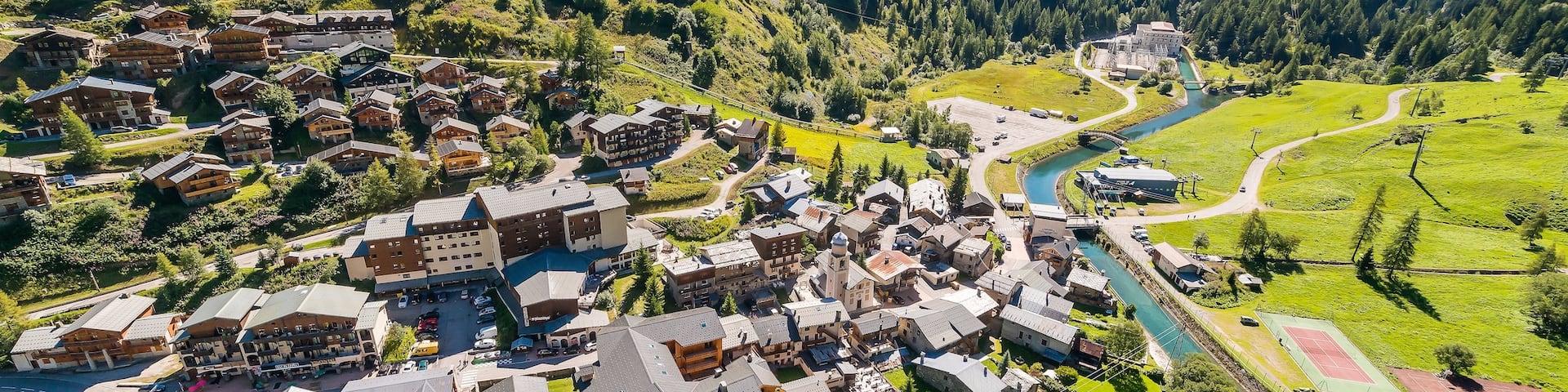 Alpes du Nord featuring a small town or village and a river or creek