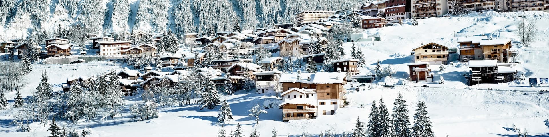 Alpes du Nord featuring mountains, snow and a small town or village