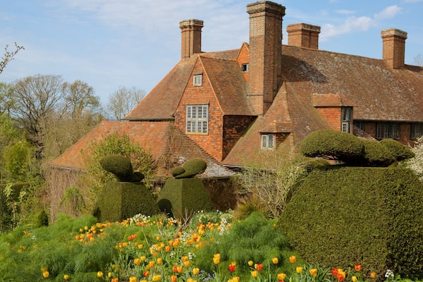 Great Dixter House and Gardens which includes heritage elements, flowers and a garden