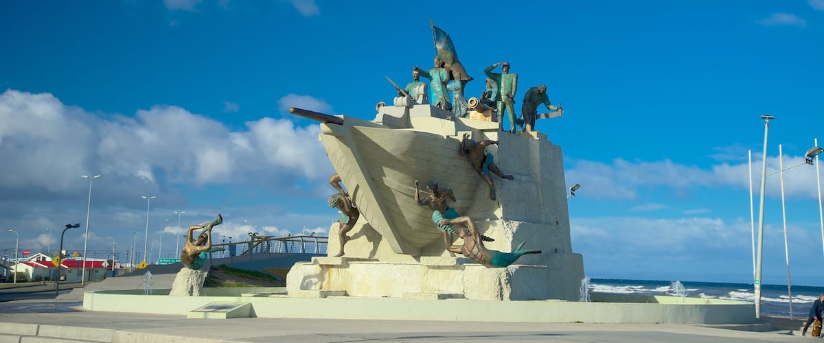 Punta Arenas which includes a statue or sculpture, outdoor art and general coastal views