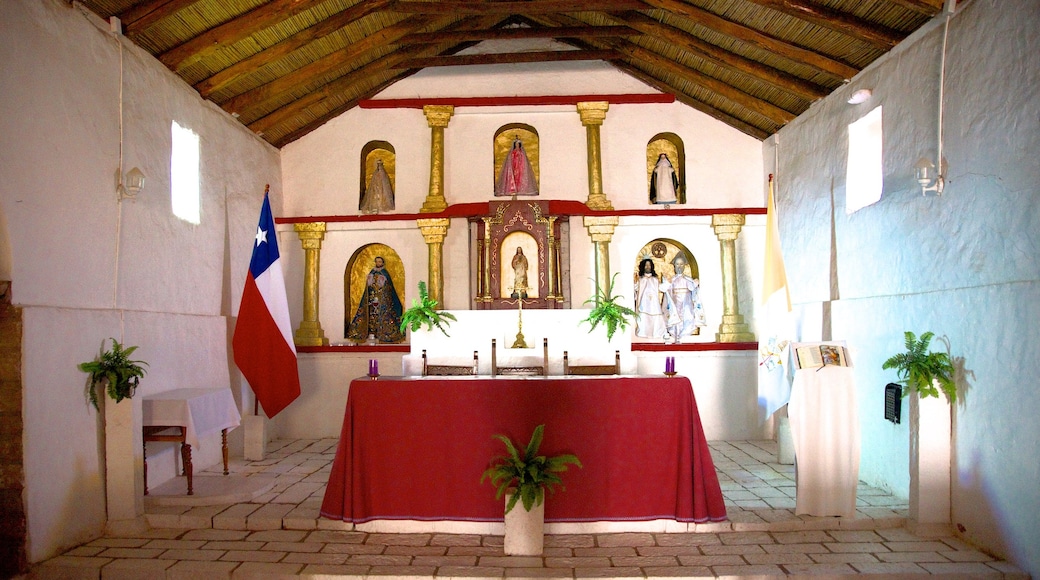 Toconao which includes interior views and a church or cathedral