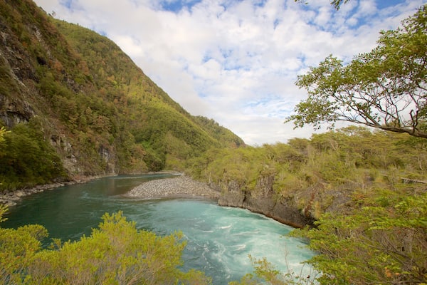 Petrohue Falls which includes mountains and a river or creek