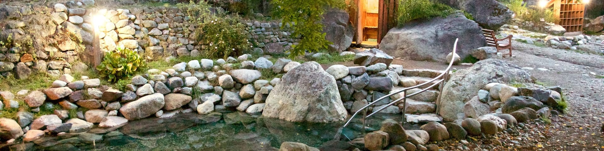 Los Pozones Hot Springs featuring a river or creek and forests