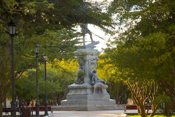 Plaza Munoz Gamero which includes a park and a statue or sculpture