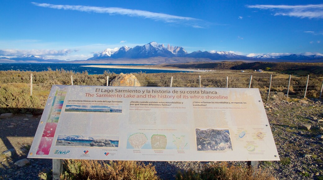 Torres Del Paine featuring tranquil scenes, a lake or waterhole and signage