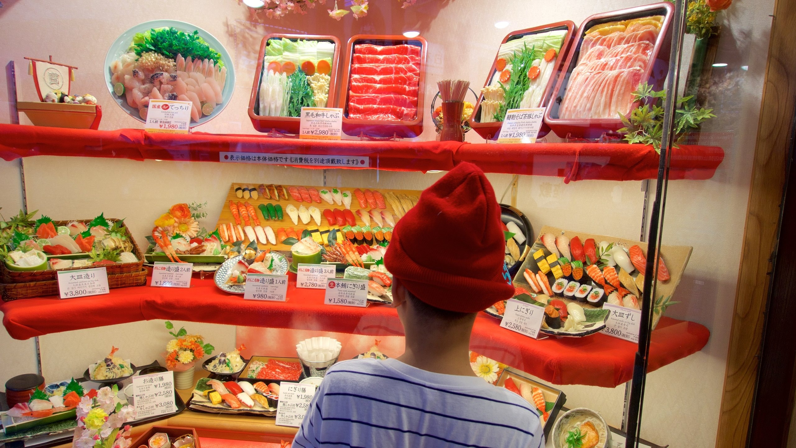 Namba featuring food as well as an individual child