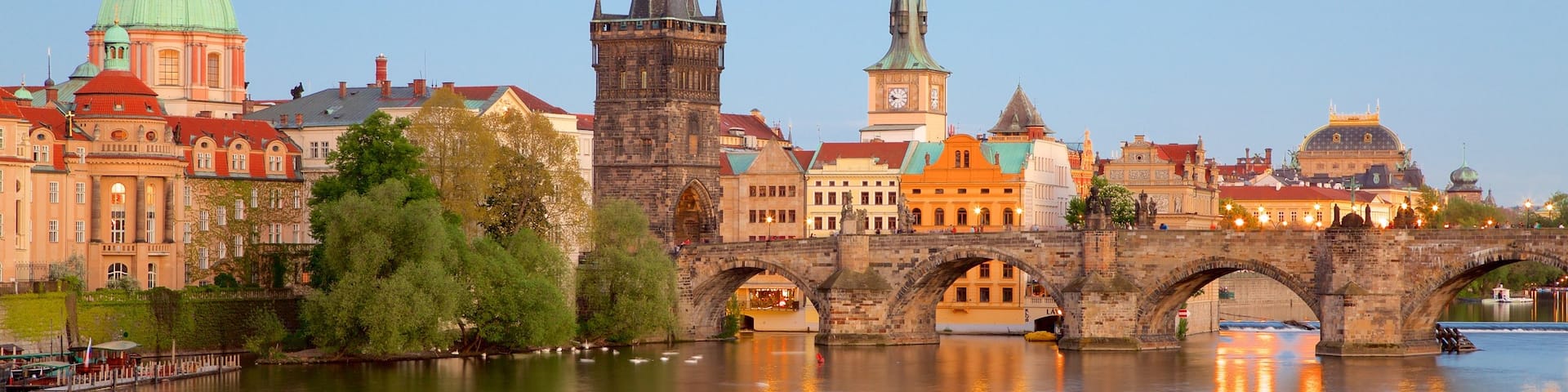 Charles Bridge featuring a bridge, a city and a river or creek