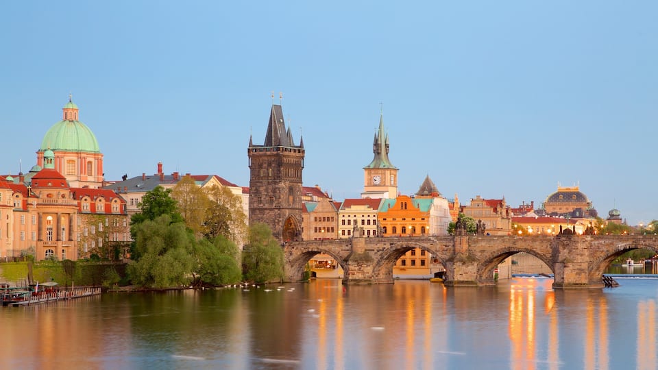 Charles Bridge featuring a bridge, a city and a river or creek