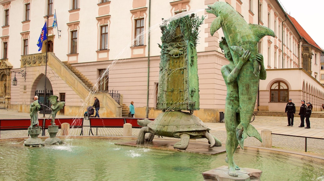 Olomouc which includes a fountain, a city and heritage elements