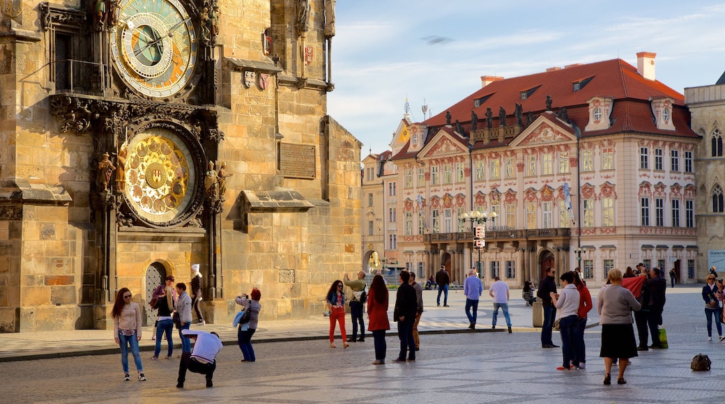 Astronomical Clock featuring a city, a square or plaza and heritage elements