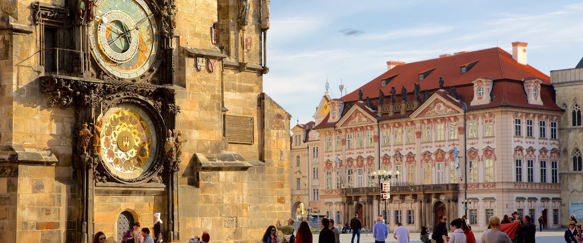 Astronomical Clock showing heritage elements, a square or plaza and a city