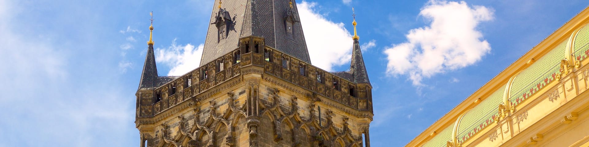 Powder Tower featuring heritage elements and a city