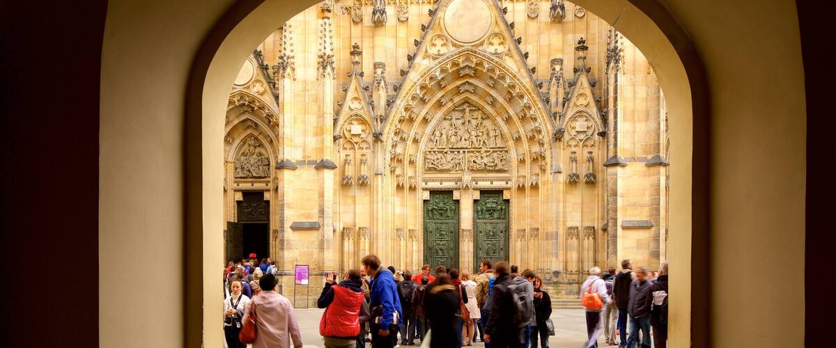 St. Vitus Cathedral showing a city, heritage elements and a square or plaza
