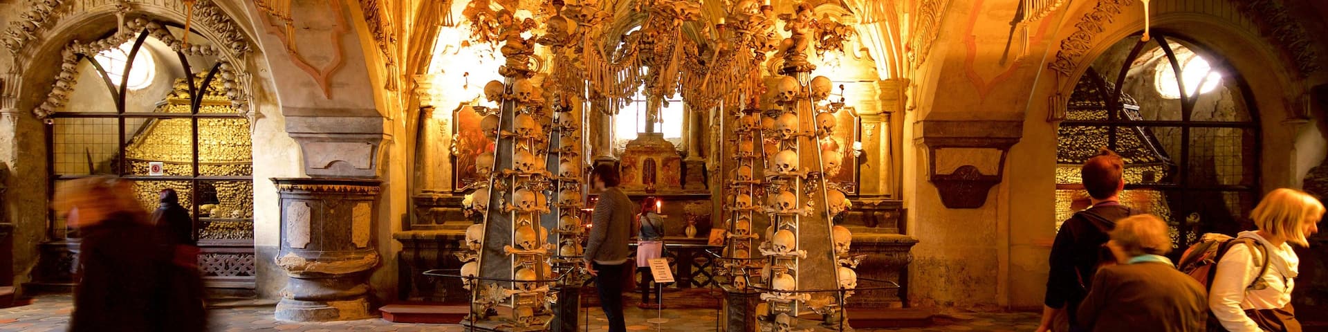 Sedlec Ossuary which includes heritage elements and interior views as well as a small group of people