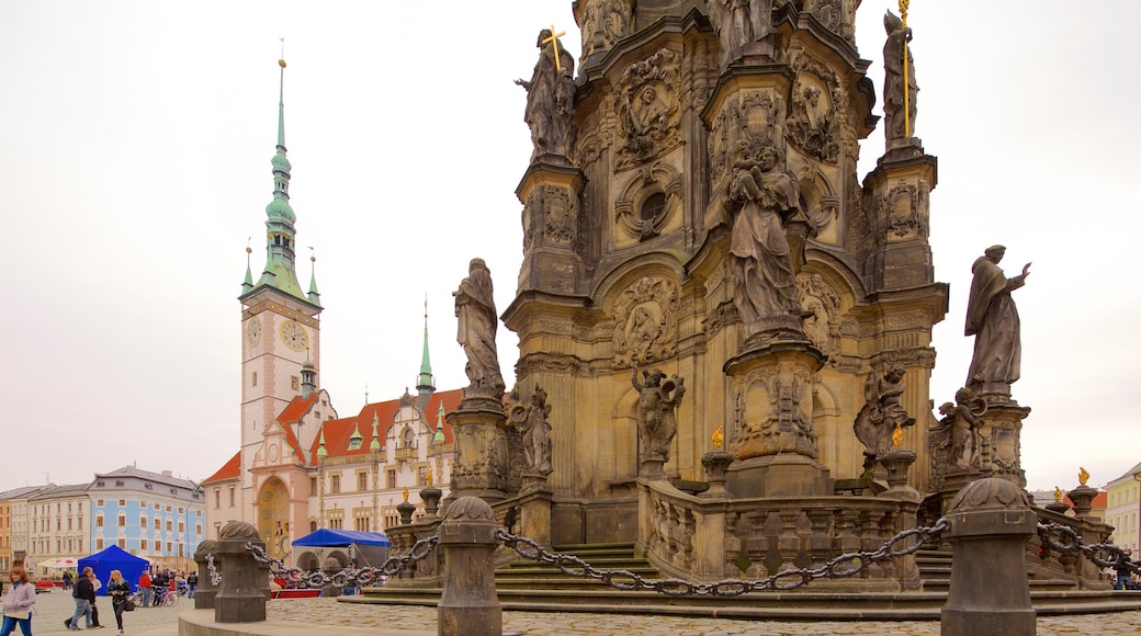 Holy Trinity Column which includes heritage elements, a square or plaza and a statue or sculpture