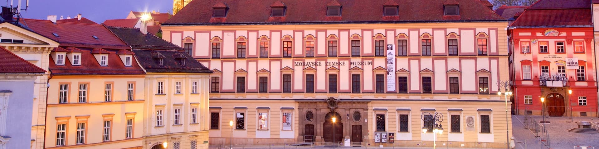 Cathedral of St. Peter and St. Paul showing a city and a sunset