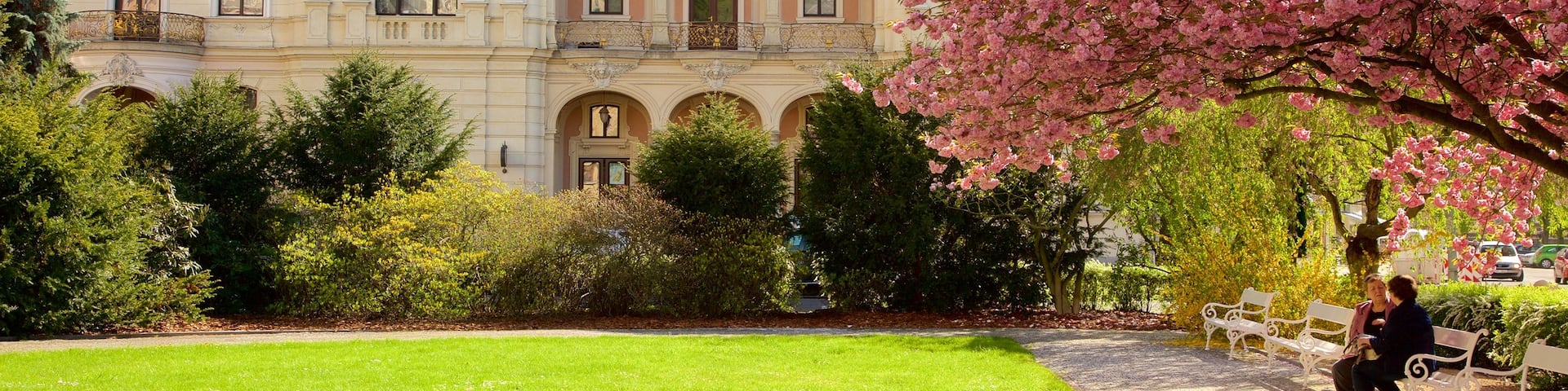 Karlovy Vary Municiple Theater featuring a garden and heritage elements