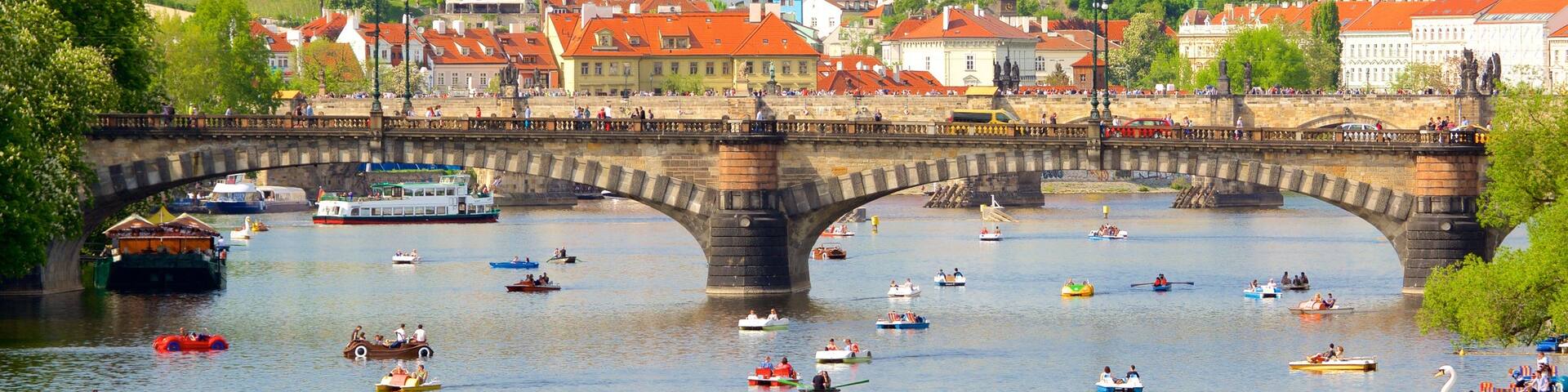 Prague showing a bridge, a river or creek and a city