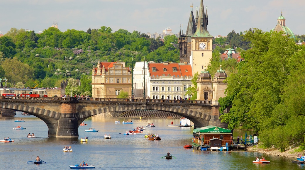 Prague showing a river or creek, kayaking or canoeing and a bridge